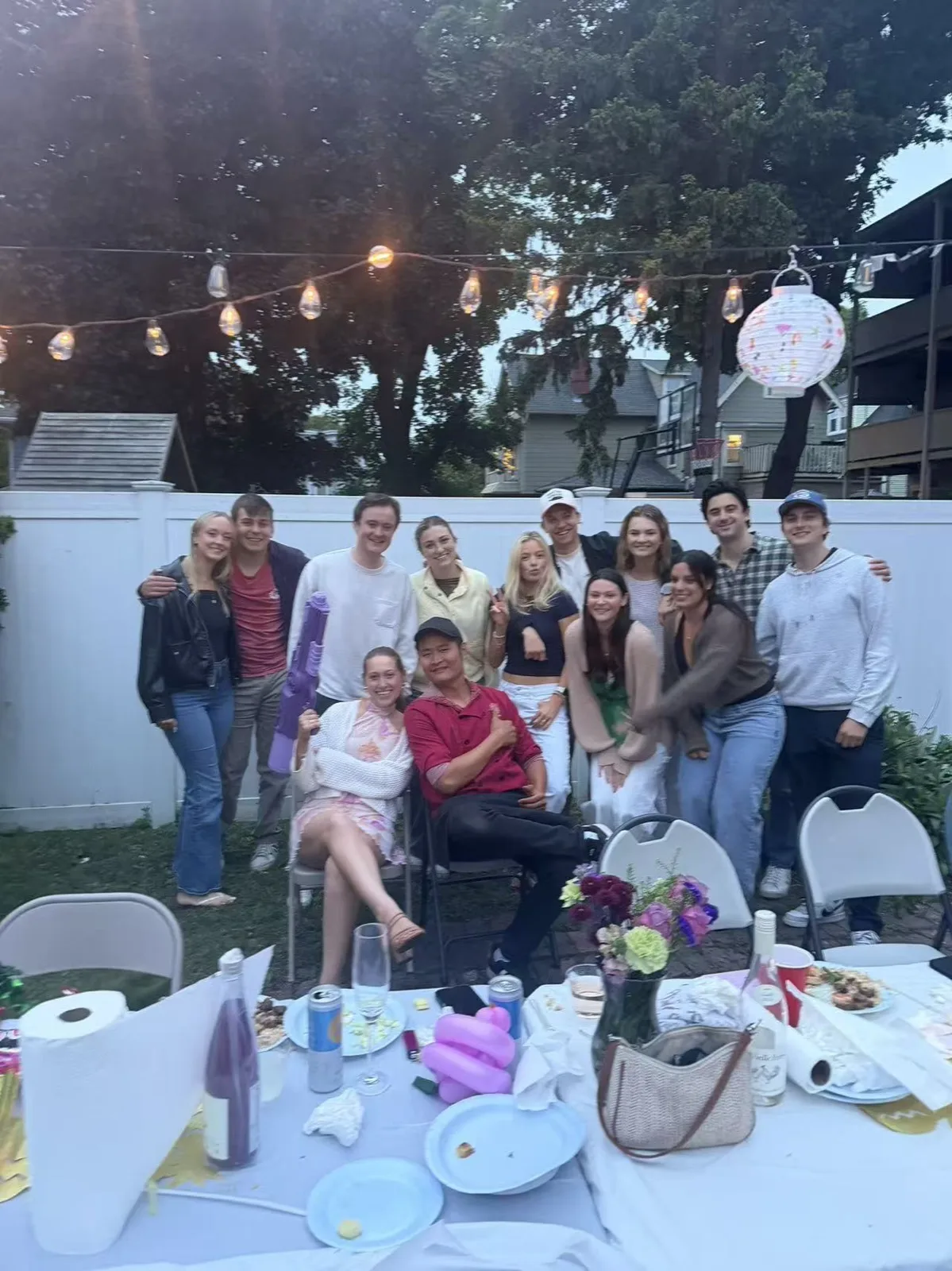 Large group of guests posing together at an evening Tiger Hibachi party in Rhode Island